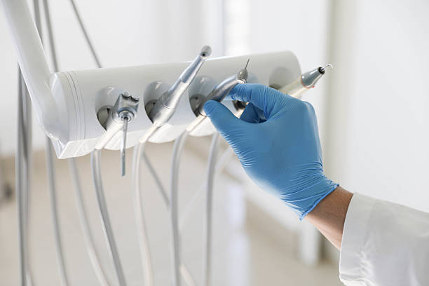 Professional Tooth Extraction technician working in Montrose, MI